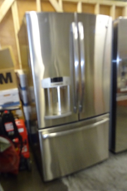 lot 1 image: Ge Stainless Steel Double Door Top Refrig