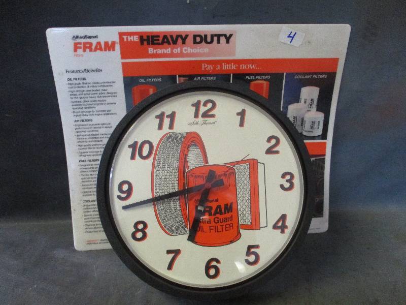 lot 4 image: Fram Filter Sign & Clock