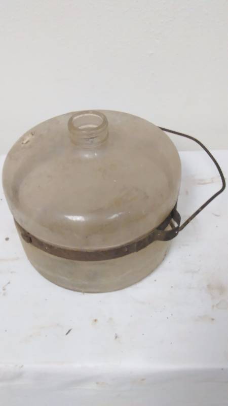 lot 17 image: ANTIQUE GLASS KEROSENE STOVE BOTTLE. GLASS ONLY MEASURES ABOUT 7.75 WIDE, 7 TALL