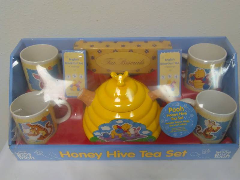 lot 44 image: Disneys Winnie the Pooh Honey Hive Tea Set Pot 4 Cups Mugs Tigger Piglet