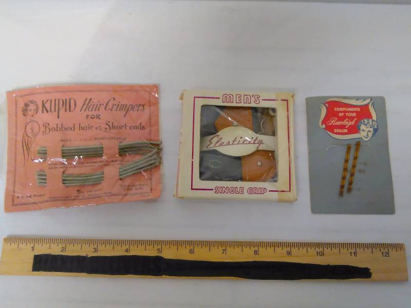 lot 64 image: Vintage Kupid Hair Crimpers, Booby pins by Rawleigh and mens suspenders in package
