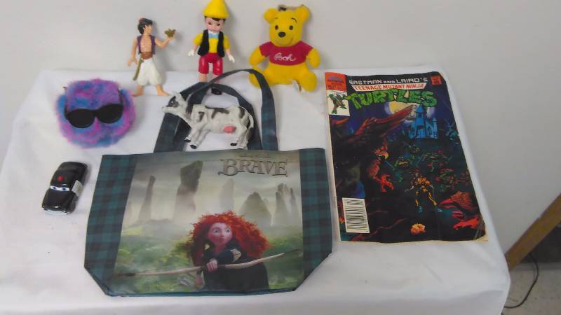 lot 90 image: Misc. collectible Disney  Pixar