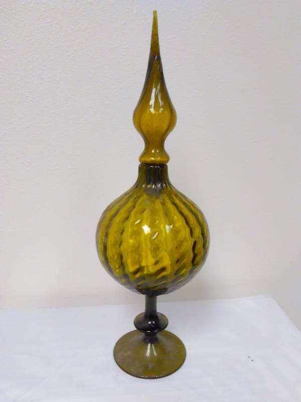 lot 137 image: Genie bottle or decanter. These bottles were made during the 1960s.