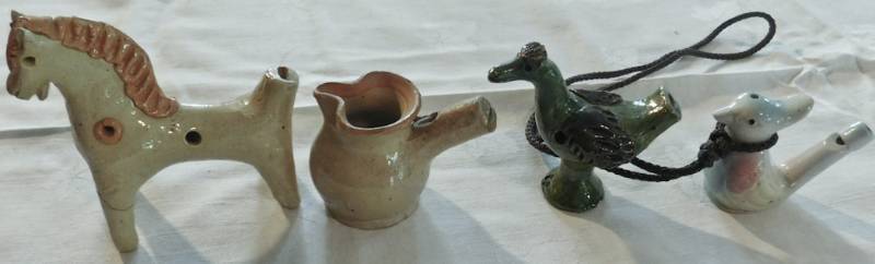 lot 63 image: 4 unique ceramic whistles