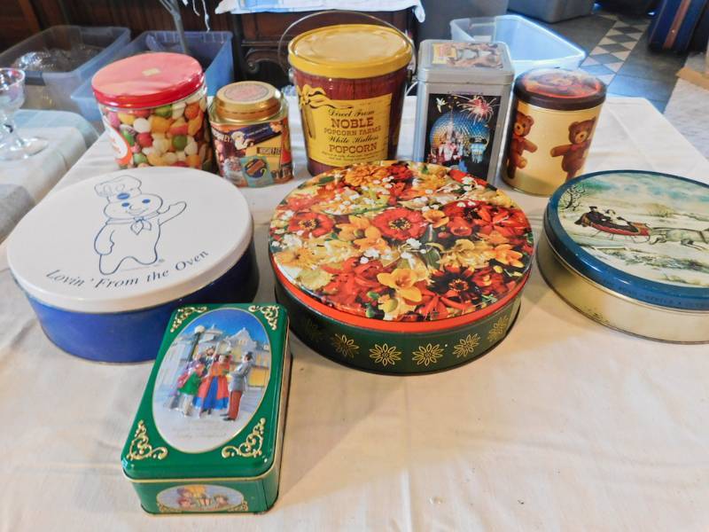 lot 82 image: tins more advertising ones