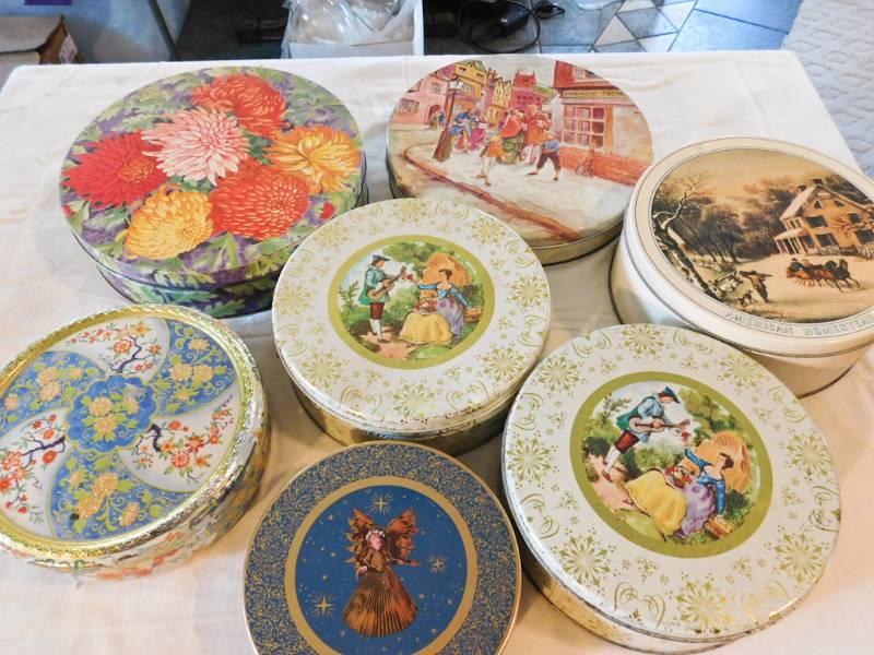 lot 83 image: tins more advertising ones
