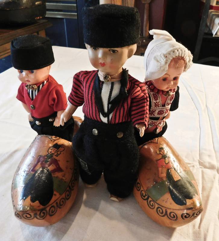 lot 117 image: Dutch clogs and Father and two children