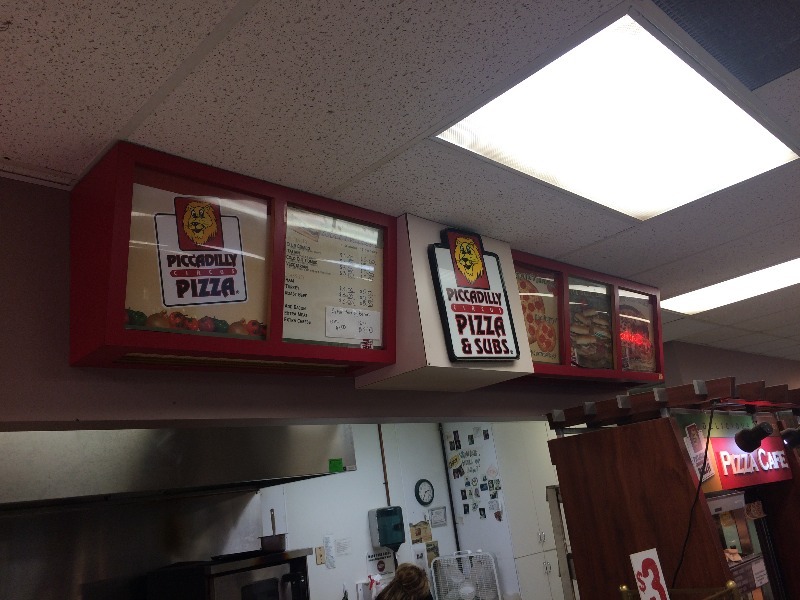 lot 24 image: Menu Wall Sign  Measures estimated  10ft long x 19 high