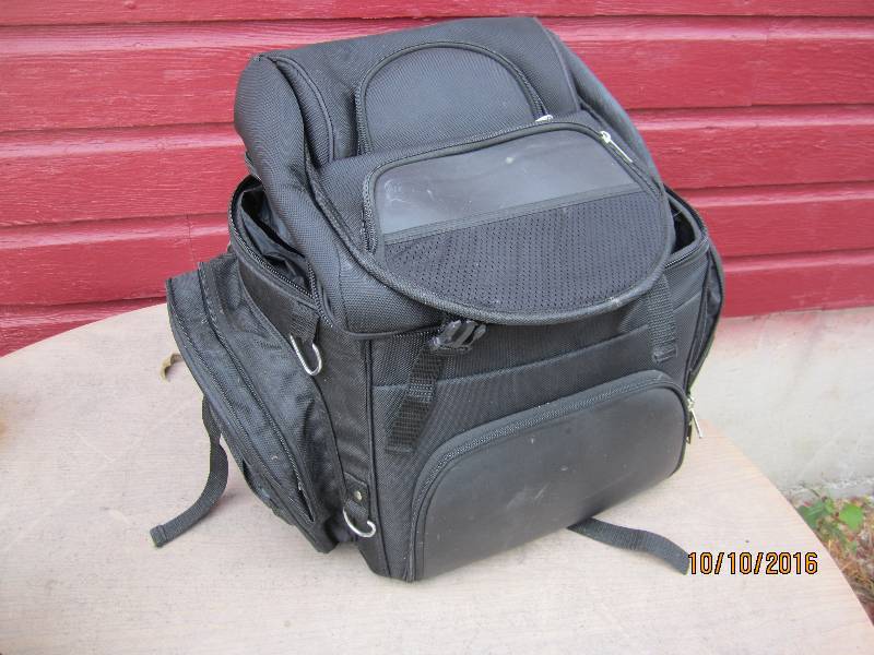 Looks like new saddle bag, lots of room for gear