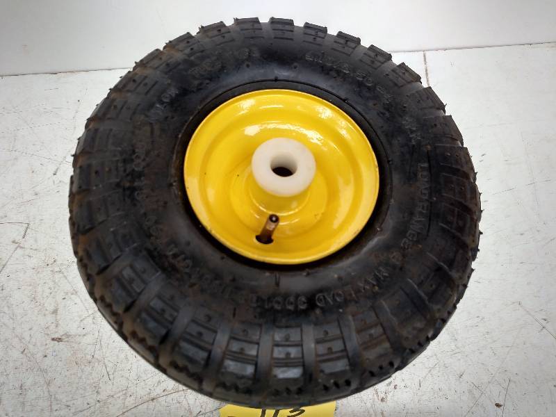 lot 113 image: (4) Tires with Rims, 4.103.50-4, 5...