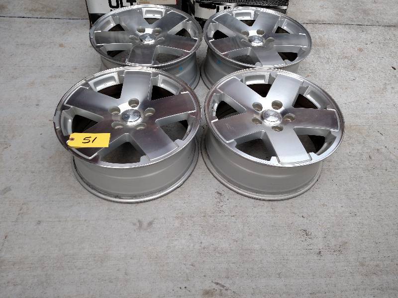 lot 51 image: (4) Factory Jeep Rims, 18 x 7, 5 ...