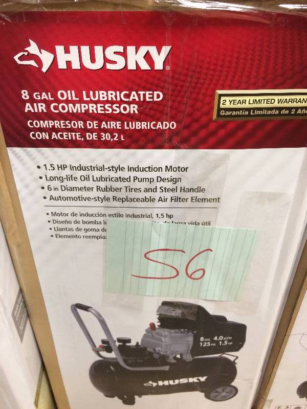 lot 56 image: Husky 8 Gal Oil Lubricrated Air Compressor New in Original Box Stock and actual photos used to display item