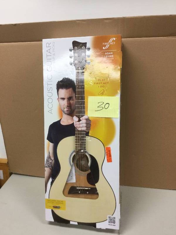 lot 130 image: First Act Acoustic Guitar never used