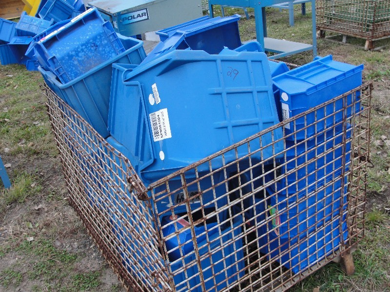 Pile of Blue Stackable Tubs with metal crate