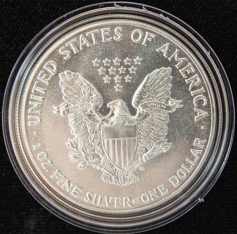 1987 AMERICAN SILVER EAGLE 1 TROY Oz. .999 FINE SILVER DOLLAR IN AIRTITE HOLDER