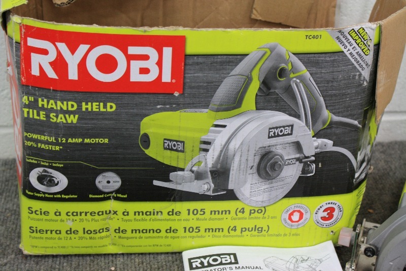 lot 128 image: Ryobi 4 Hand Held Tile Saw