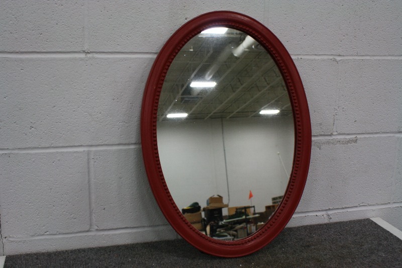 lot 134 image: Red Oval Mirror