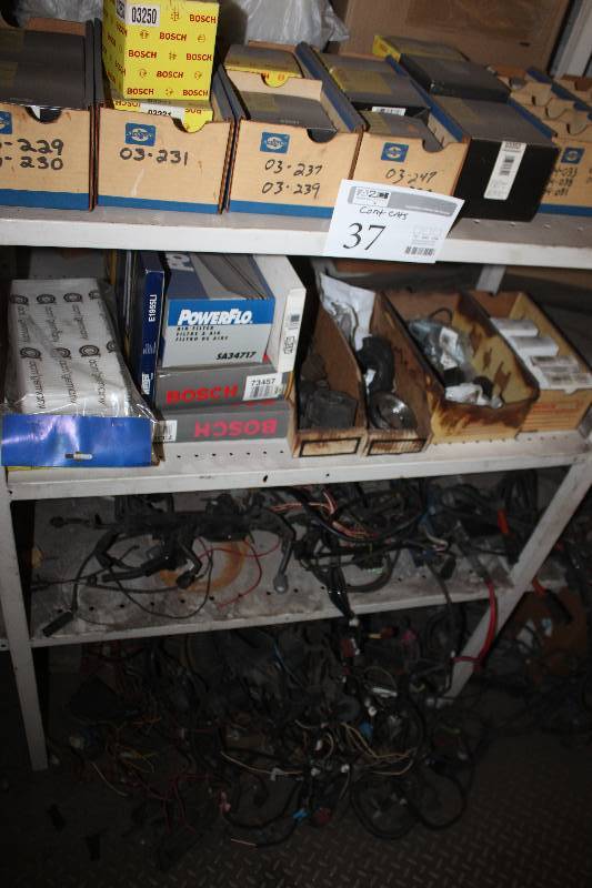 lot 37 image: Contents Including Hardware, Bosch Distributor Caps, Bosch Filters, And More