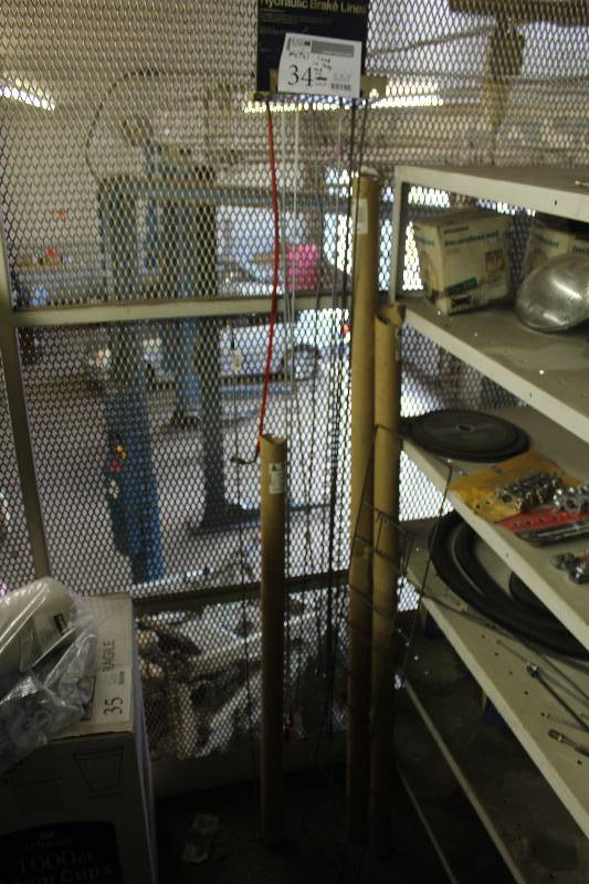 lot 34 image: Metal Hydraulic Lines In Tubes & On Wall