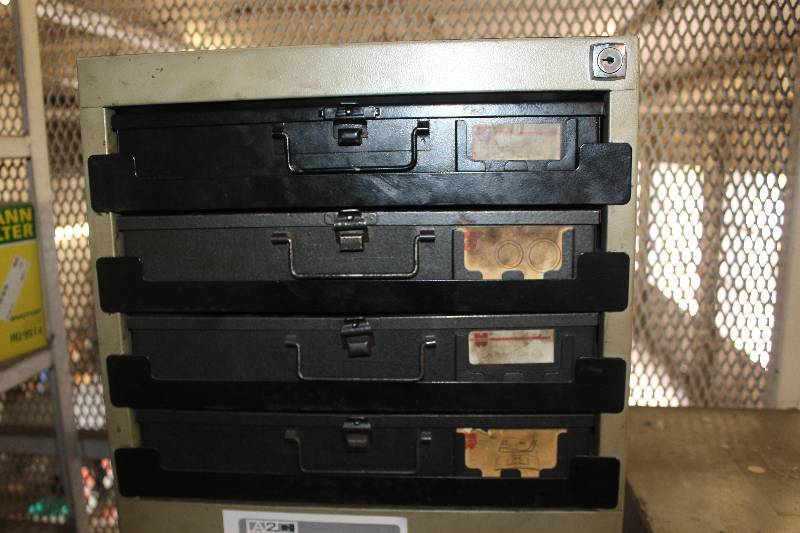 lot 23 image: Dorman Style Parts Organizer Contents Included Assorted Drain Plugs, And More