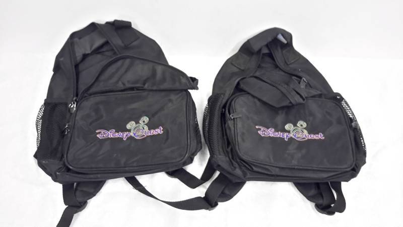 lot 13 image: Pair of Disney Quest backpacks