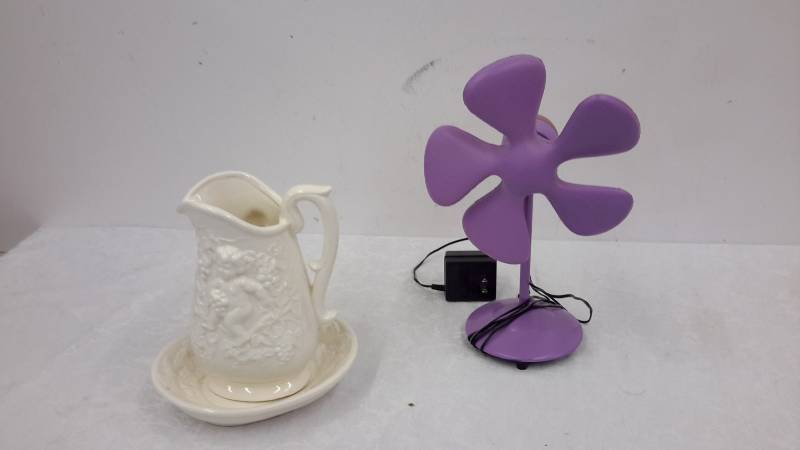 lot 38 image: Pitcher and fan