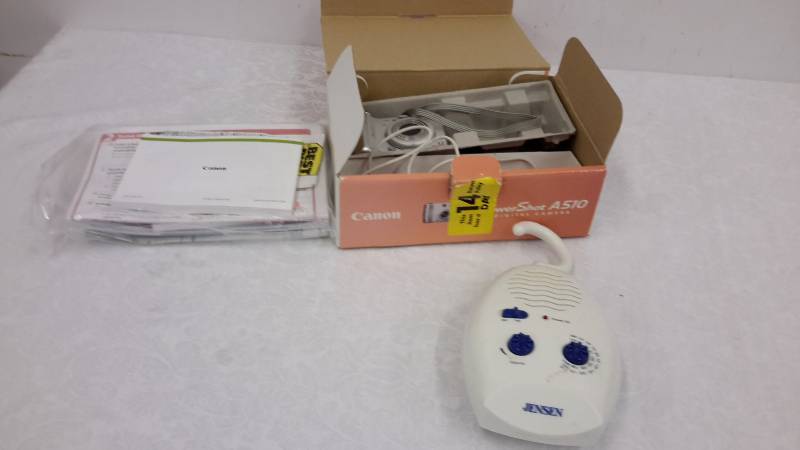 lot 42 image: Water resistant radio and Canon Powershot A510