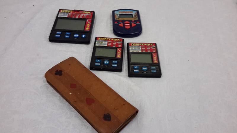lot 45 image: Electronic travel games and cards in case