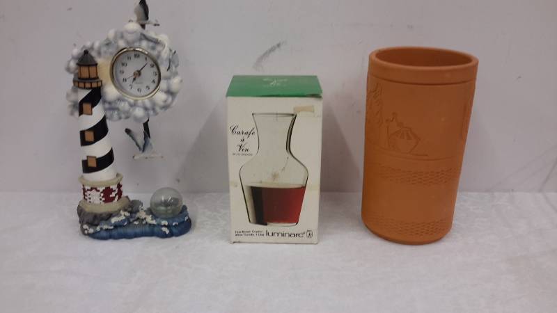 lot 58 image: Clock, carafe and clay vase