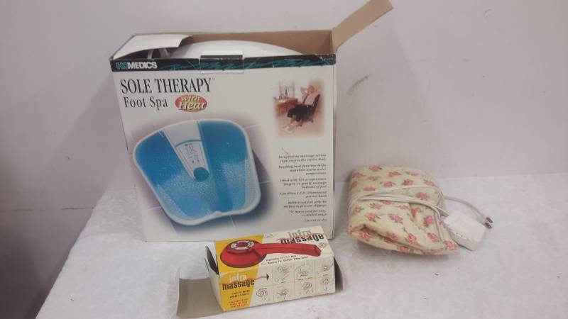 lot 109 image: Foot spa, heating pad, and heat massager