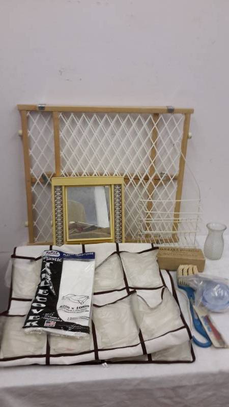 lot 140 image: Gate, shoe holder, lighted mirror, buttonholer, tablecloth, brush, vase, and more
