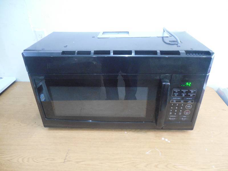 lot 7 image: Magic Chef 1.6 cu. ft. Over the Range Microwave in Black