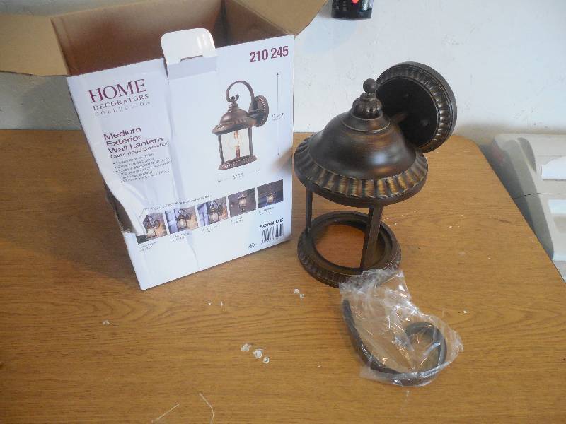 lot 16 image: Home Decorators Collection Cambridge Outdoor Essex Bronze Medium Wall Lantern