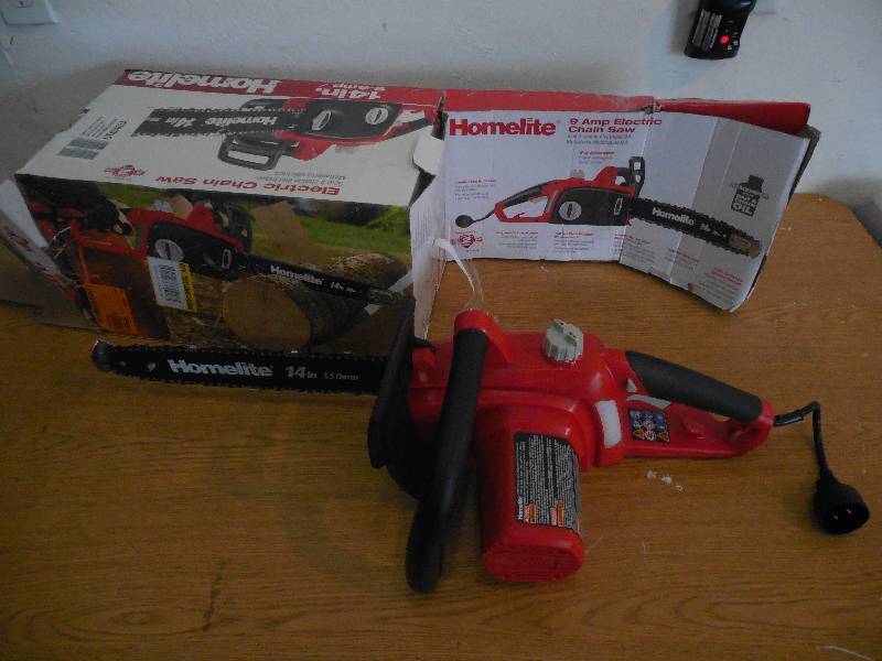 lot 57 image: Homelite 14 in. 9 Amp Electric Chainsaw
