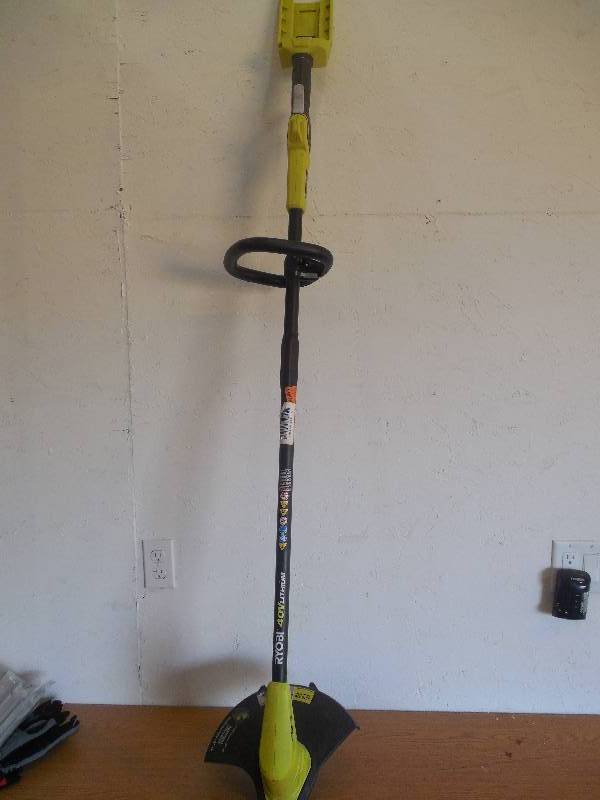 lot 76 image: Ryobi 40-Volt Lithium-ion Cordless Attachment Capable String Trimmer