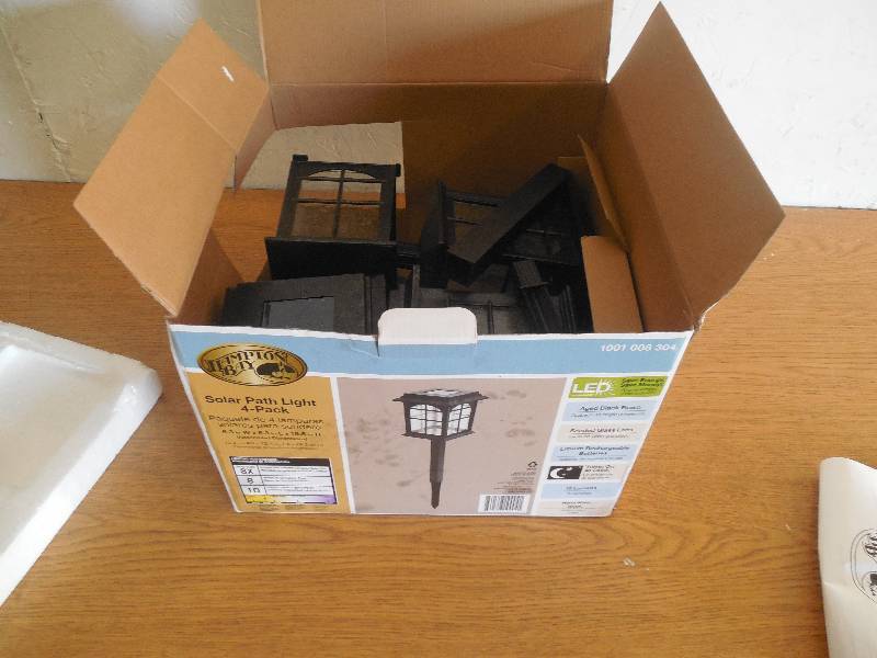 lot 99 image: HAMPTON BAY 4 PACK SOLAR LIGHTS