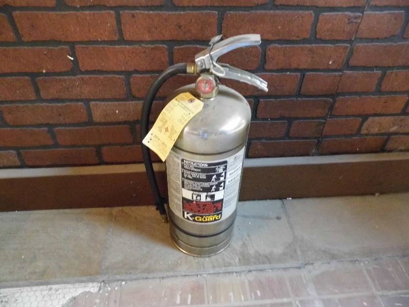 lot 102 image: Fire Extinguisher - Napkin Dispensers - Cutlery