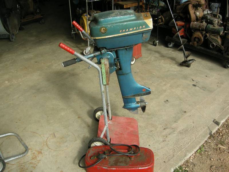 lot 25 image: Vintage Champion 5-12 hp Anniversary Outboard Motor