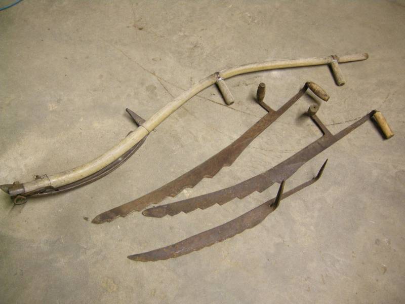 lot 108 image: Antique Scythe and Hay Saws