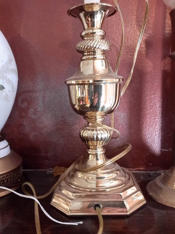 lot 97 image: 2, Table lamps.. Both about 30 in h.. One brass with shade.. One no shade