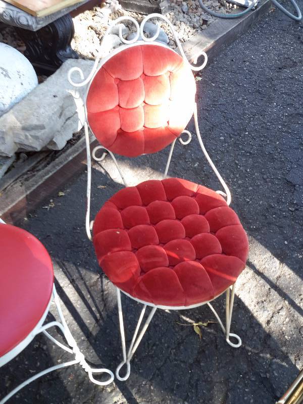lot 19 image: 2 Wrought Iron Chairs.. 1 is an Ice Cream Chair.. 1 is a dressing table chair.
