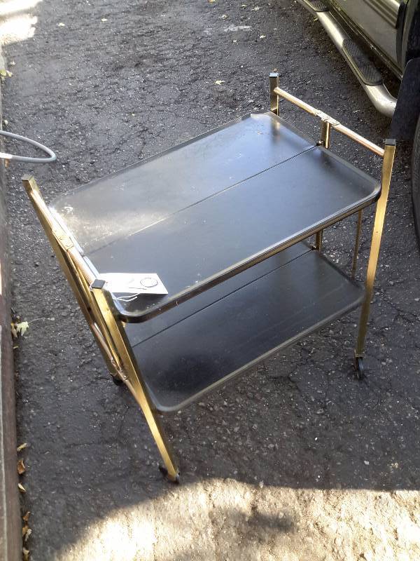 lot 20 image: Mid Mod Bar Cart.. Folds up to 12 size for storage against a wall.