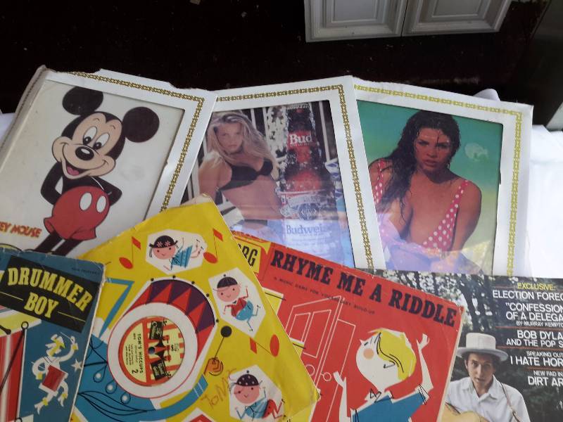 lot 21 image: Misc. vintage Childrens records.. A couple provocative gal pictures for the man cave.