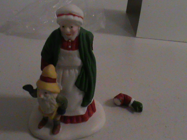 Dept. 56 - Mrs. Claus with a broken arm (needs to be glued on - broken) Arm is in box