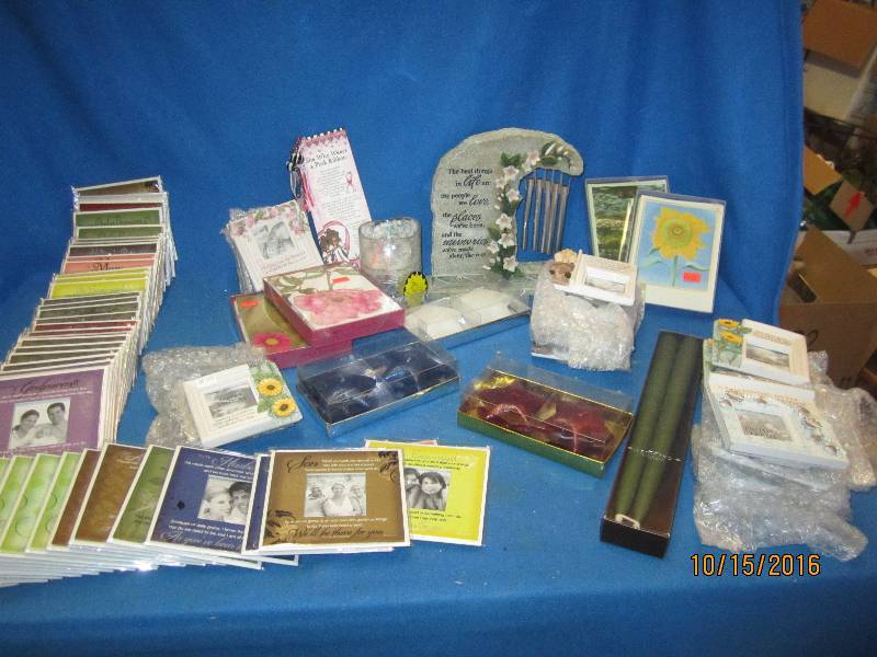 Bin of designer cards magnets and m...