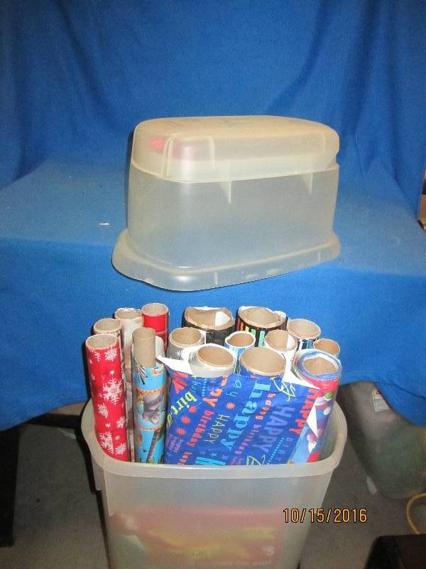 wrapping paper in a plastic storage...