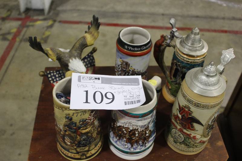 lot 109 image: Assorted Beer Steins (handcrafted for Anheuser-Busch Inc.) and Eagle Statue