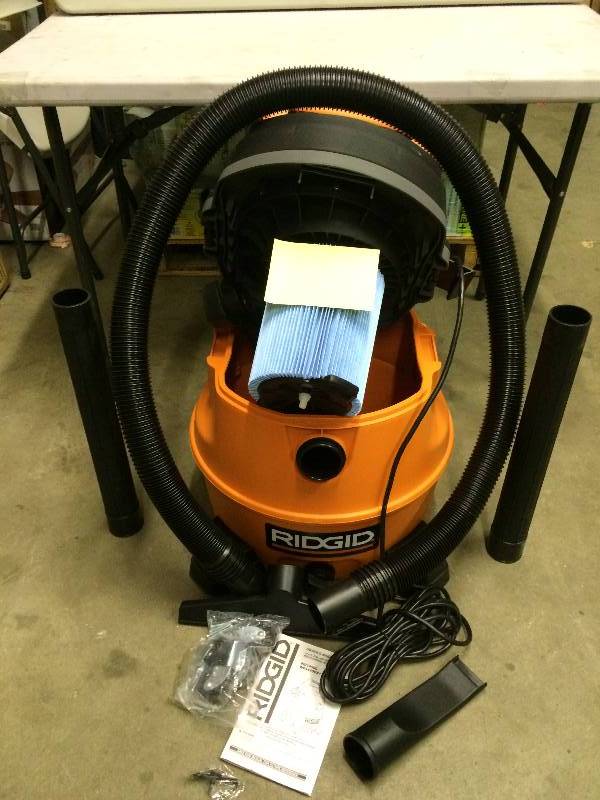 lot 32 image: RIDGID 14 gal. 6.0-Peak HP Wet Dry Vac  in like Nerw working conditions