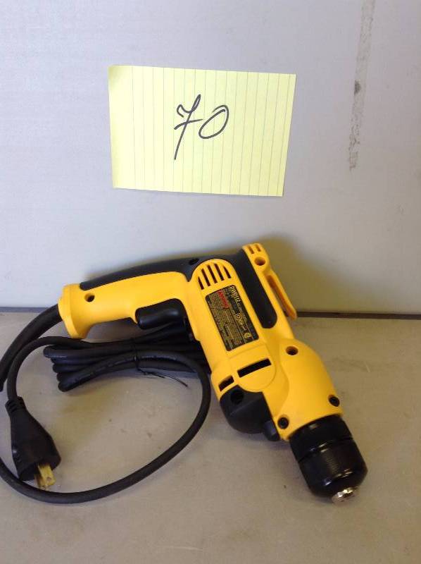 lot 70 image: Dewalt 38 in. (10 mm) Variable Speed Reversing Pistol Grip Drill with Keyless Chuck Never used stock and actual photos used to display item