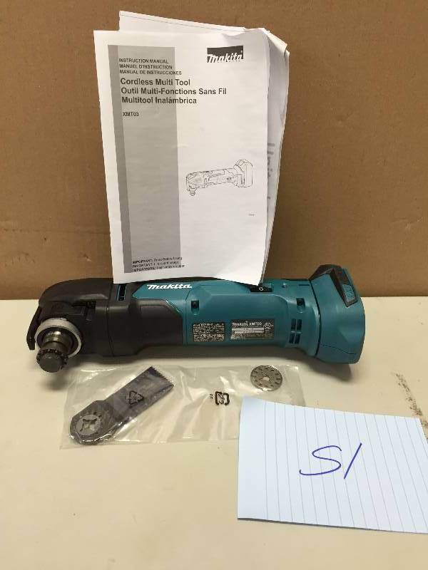 lot 51 image: Makita XMT03Z 18V Volt LXT Cordless Oscillating Multi-Tool Never used Stock and actual photos used to display item